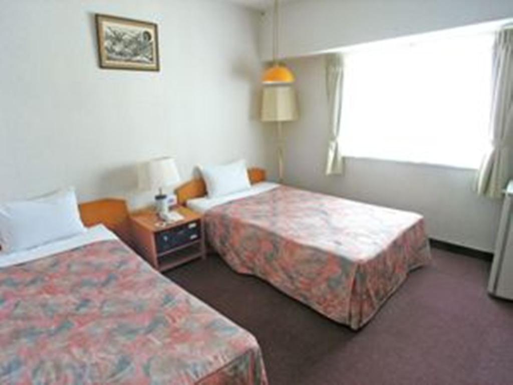 Okinawa Hotel Continental Наха Стая снимка
